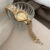 Diamond-Shaped Gold Bracelet Watch