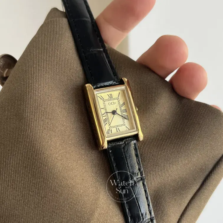 Classic black leather square Roman numeral gold dial watch