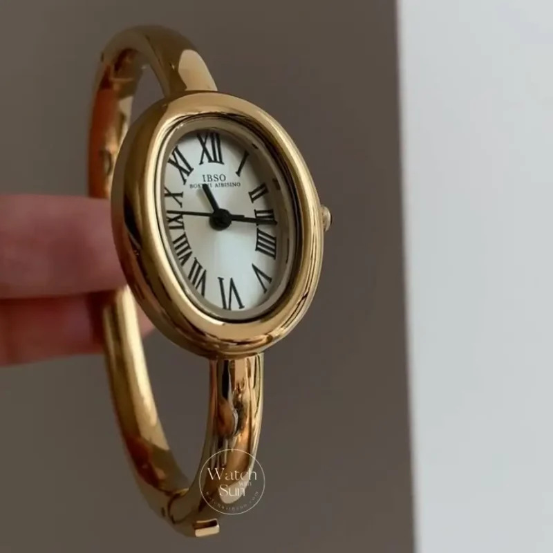 Vintage Gold Oval Watch for Women Roman Numeral Dial Bangle Watch