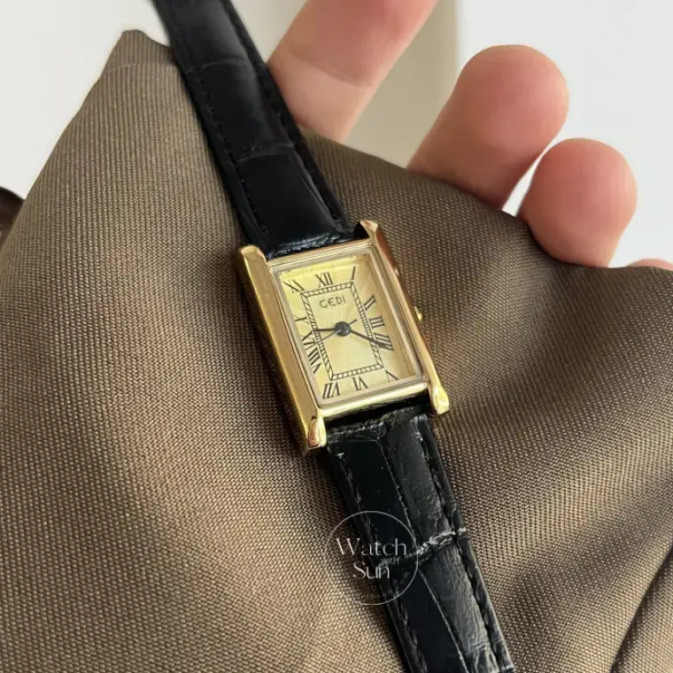 Classic black leather square Roman numeral gold dial watch