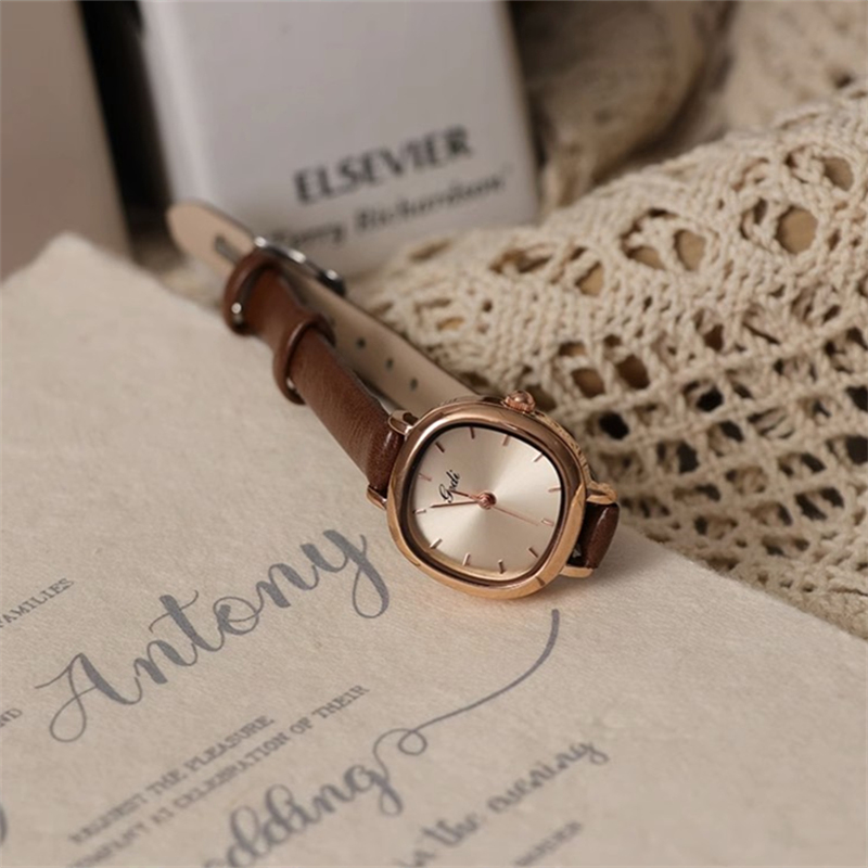 Chic Brown/Black Oval Leather Watch for Women
