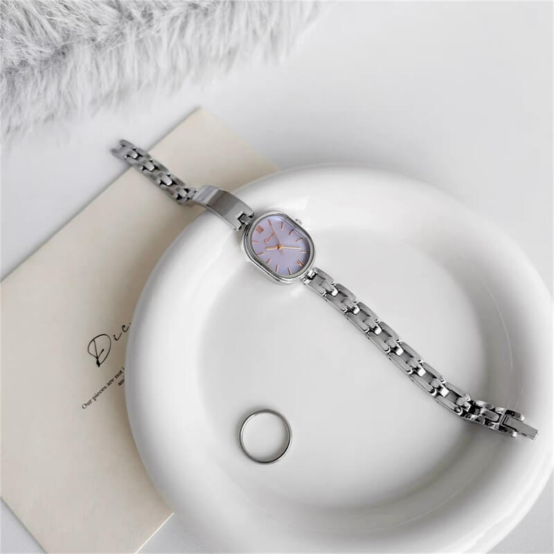 Oval Face Gold Bracelet Watch