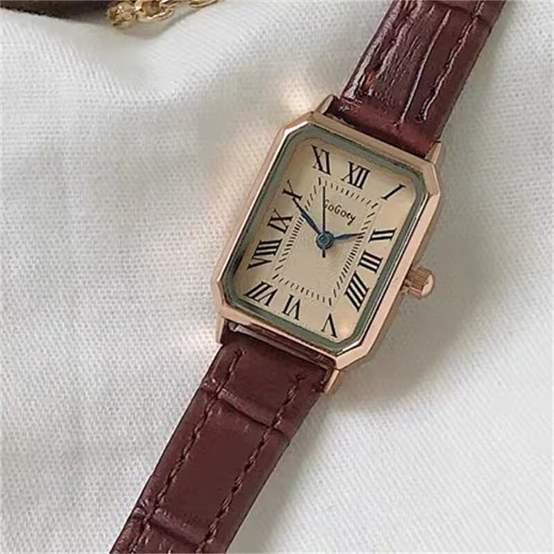 Brown square face watch with brown band