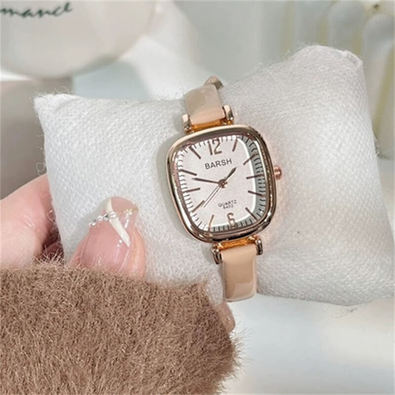 oval face watch with pink leather band