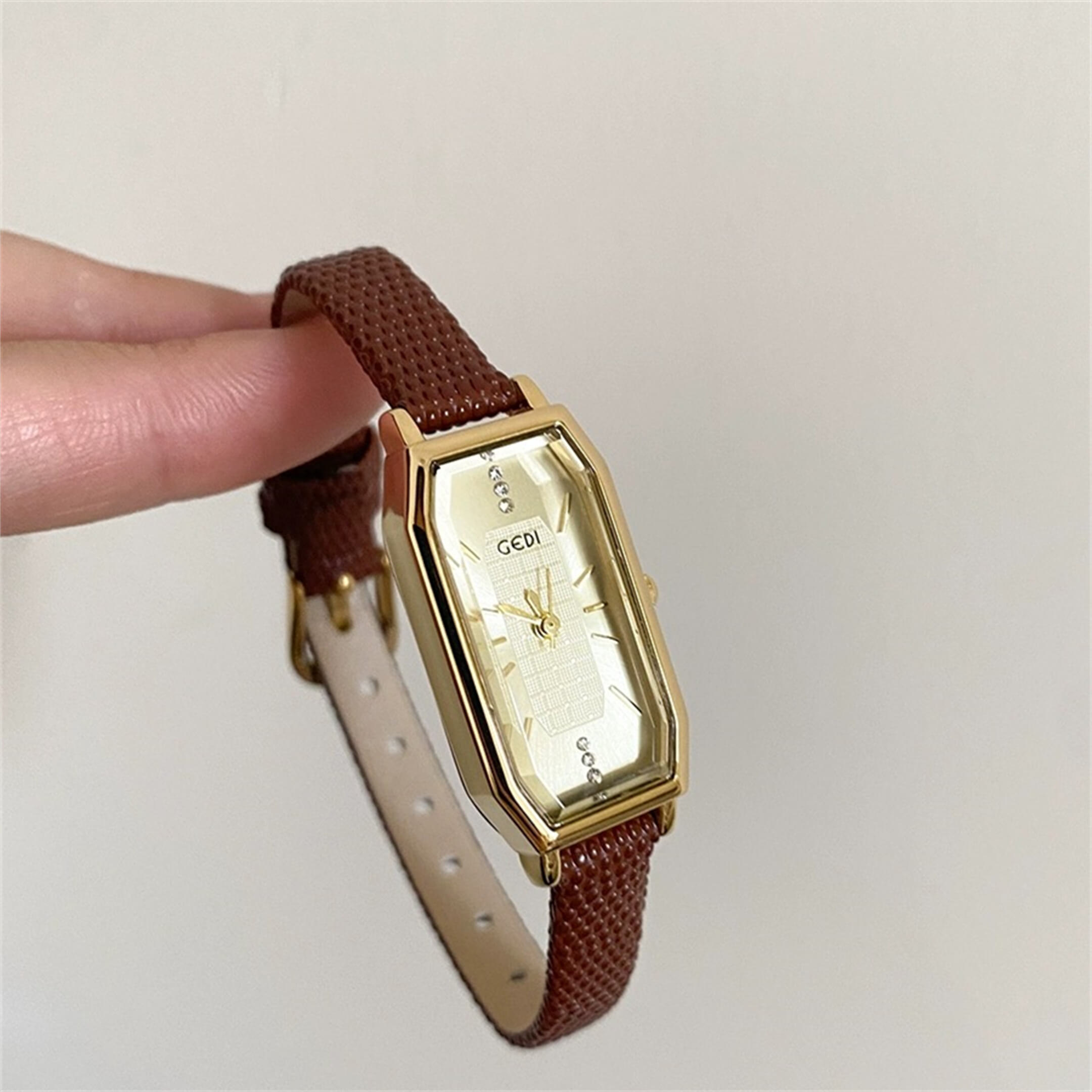 dainty gold watch