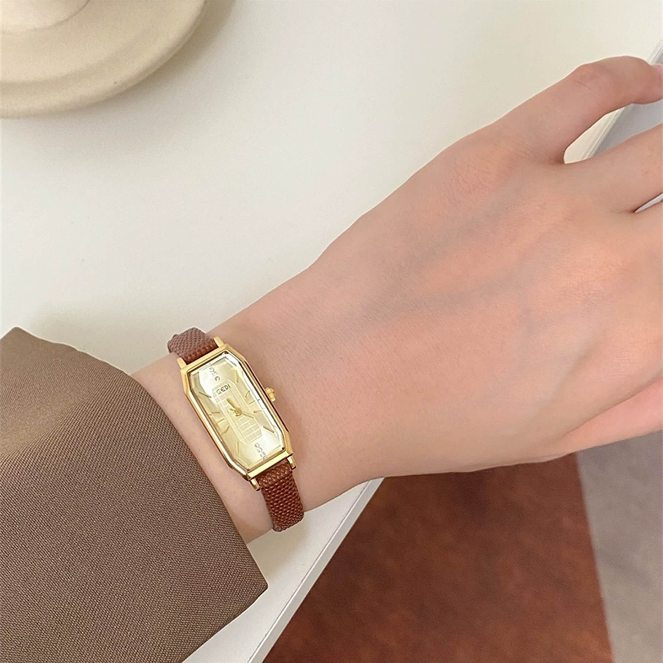 dainty gold watch