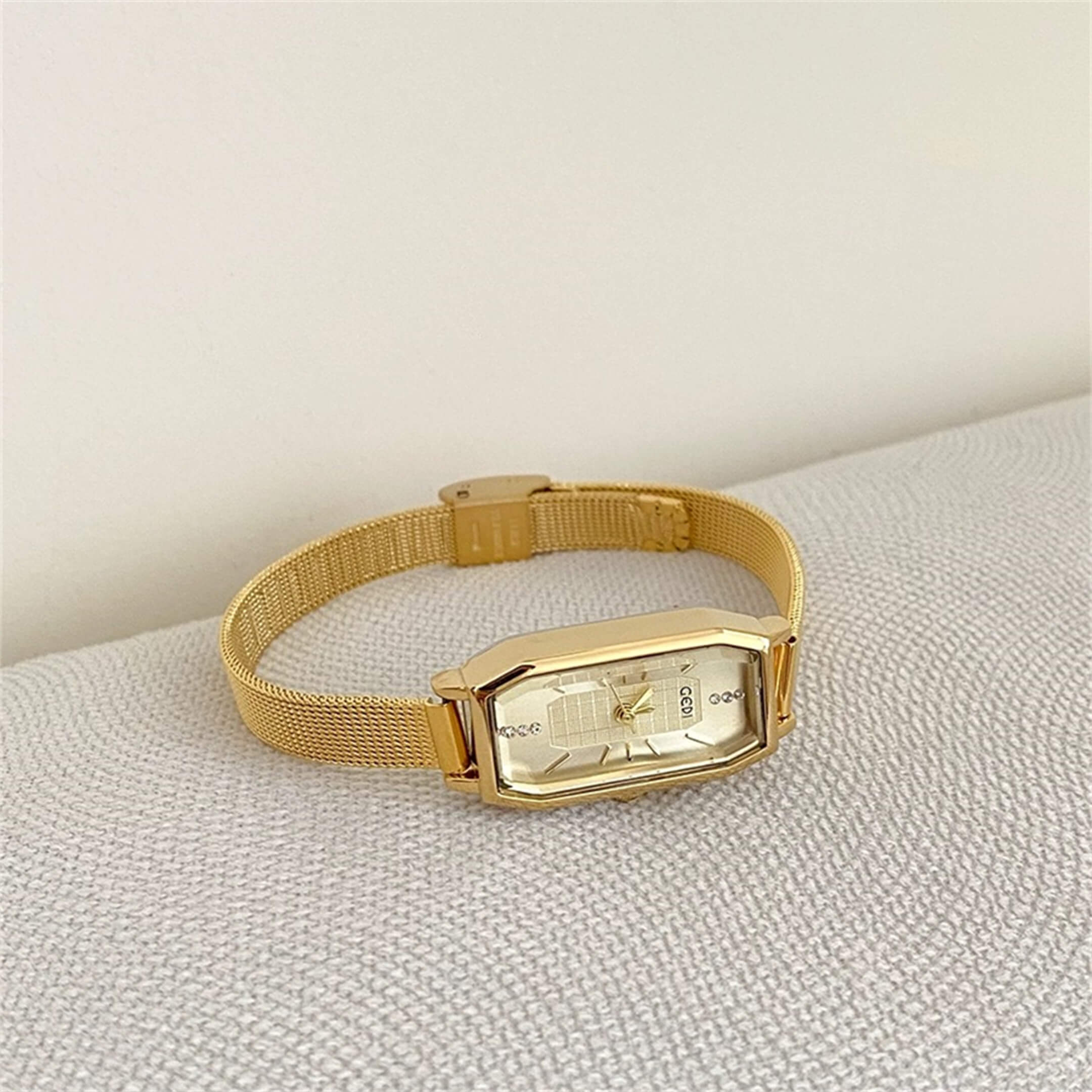 dainty gold watch