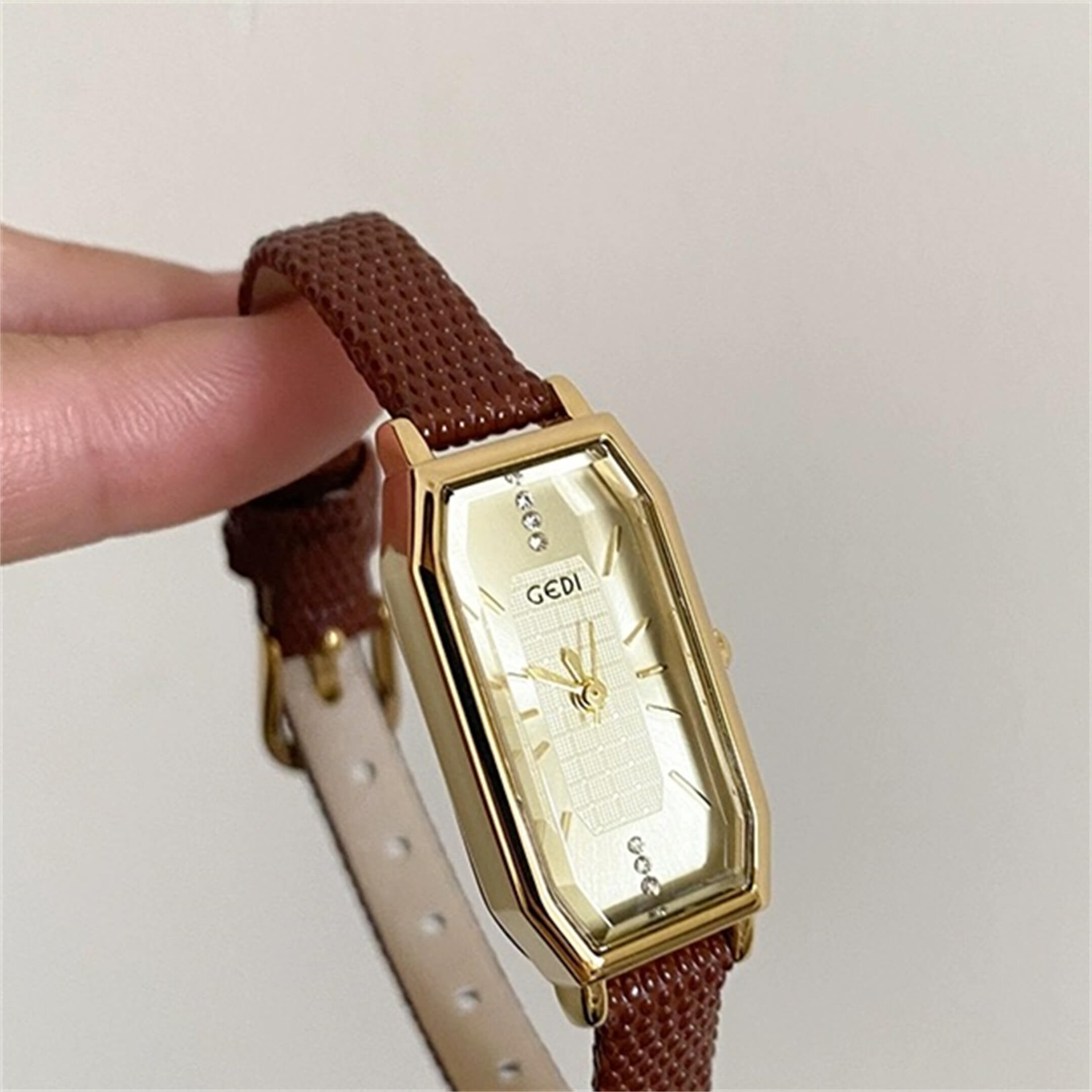 dainty gold watch