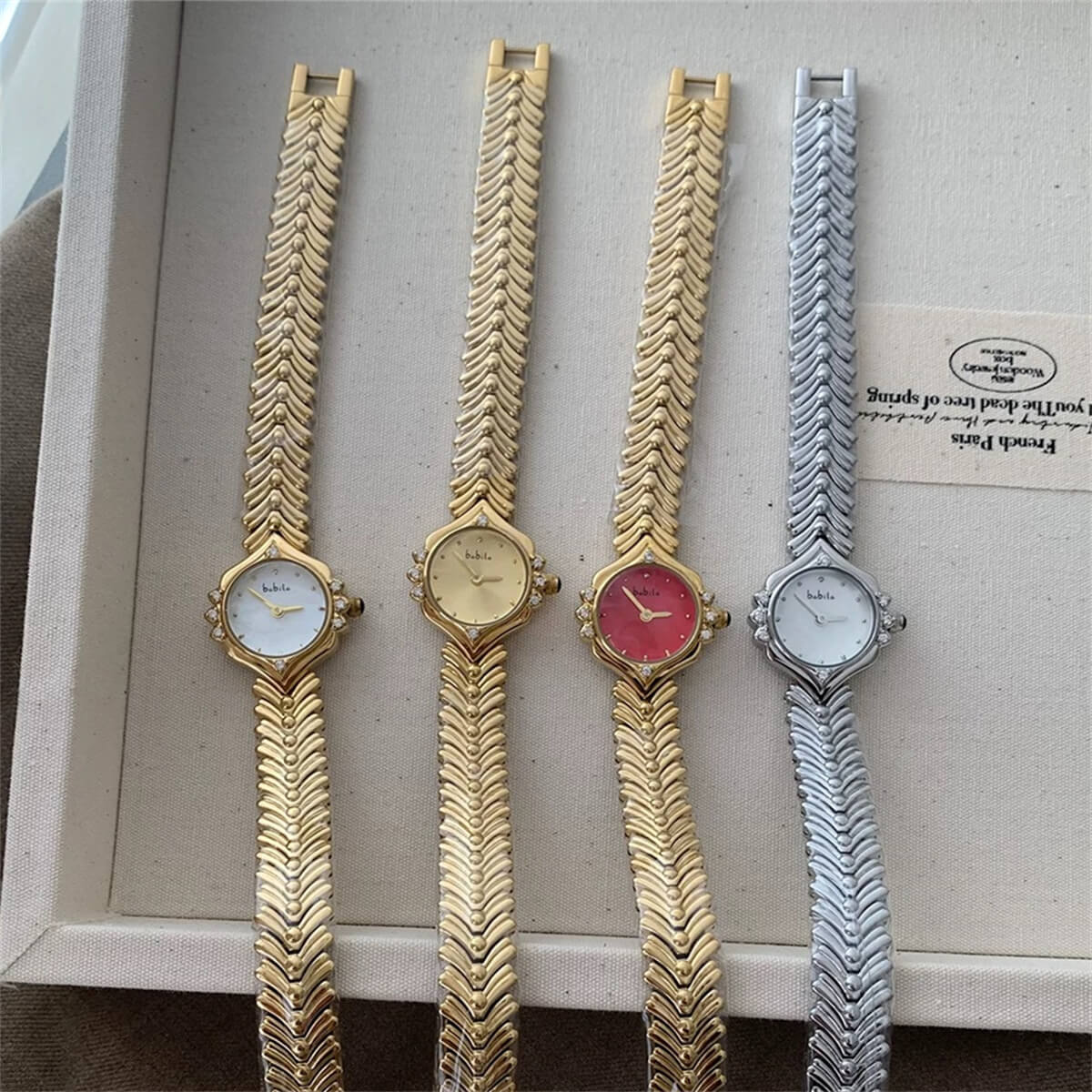 Vintage style pink face gold bracelet watch