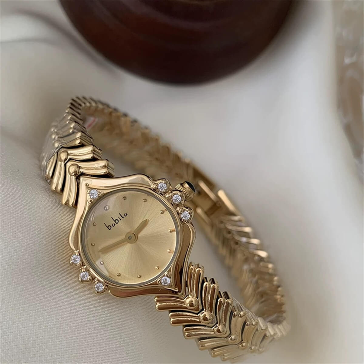 Vintage style pink face gold bracelet watch