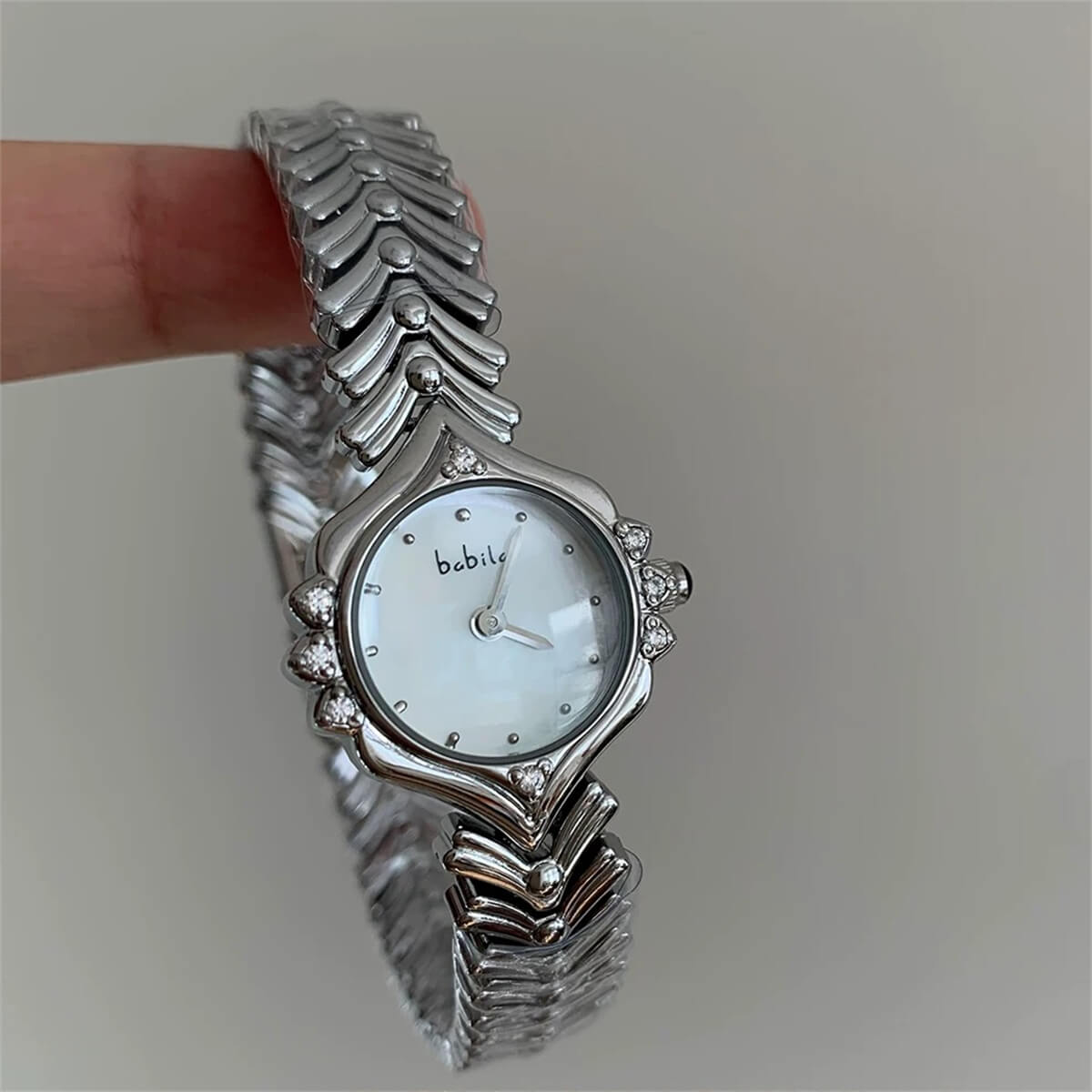 Vintage style pink face gold bracelet watch