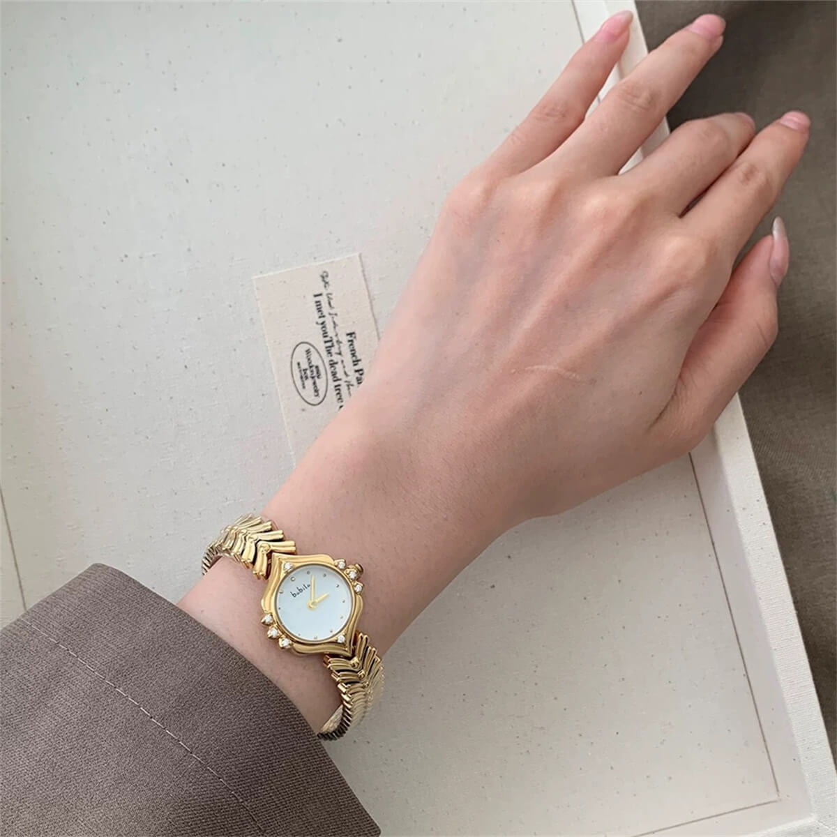 Vintage style pink face gold bracelet watch