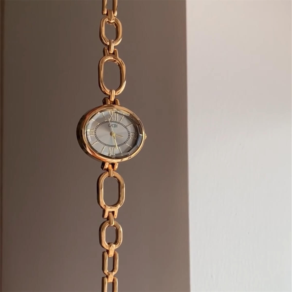 Women’s Oval Face Gold Bracelet Watch