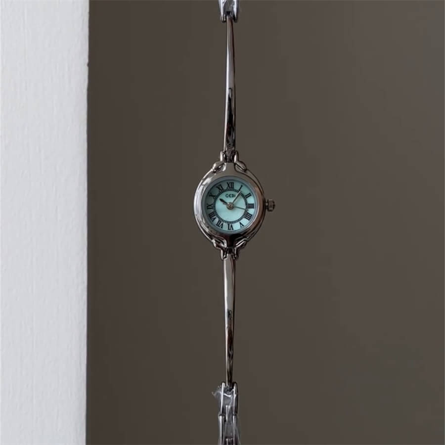 Round Face Gold Bracelet Watch