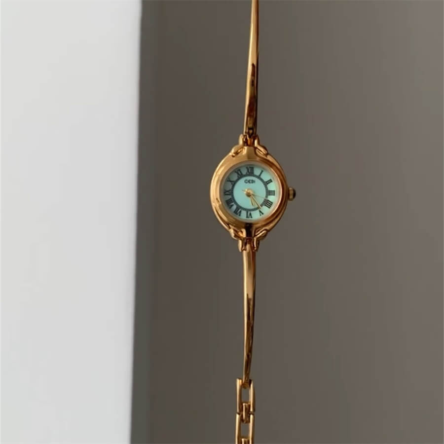 Round Face Gold Bracelet Watch