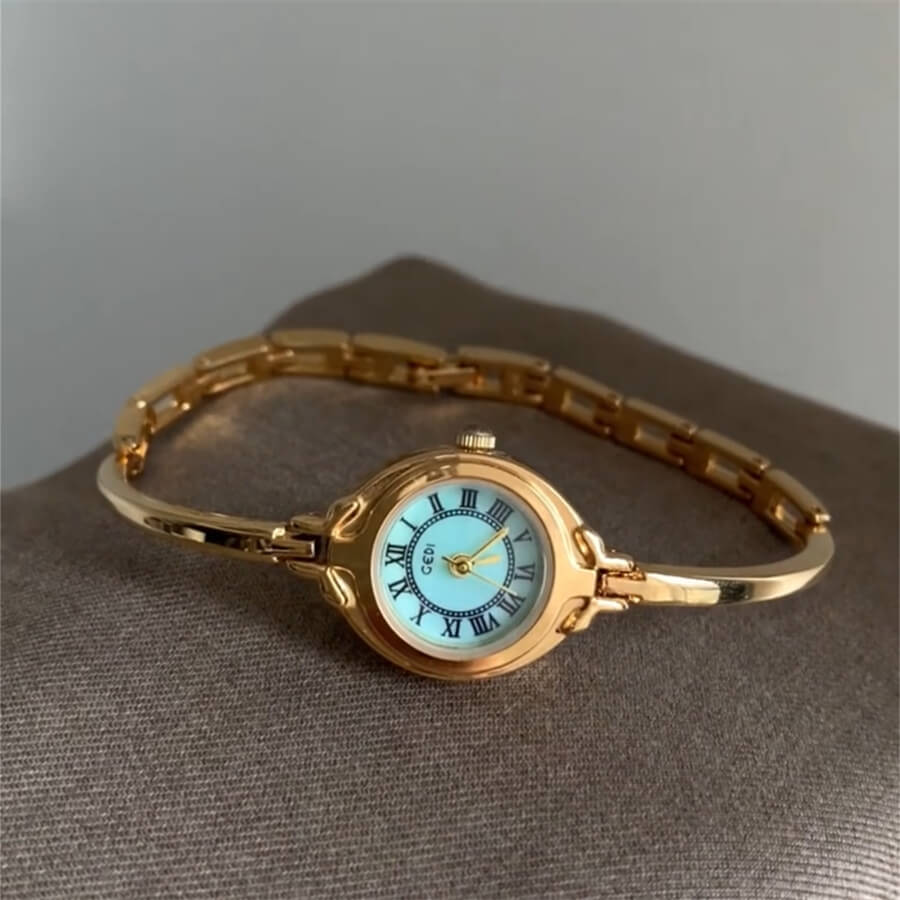 Round Face Gold Bracelet Watch