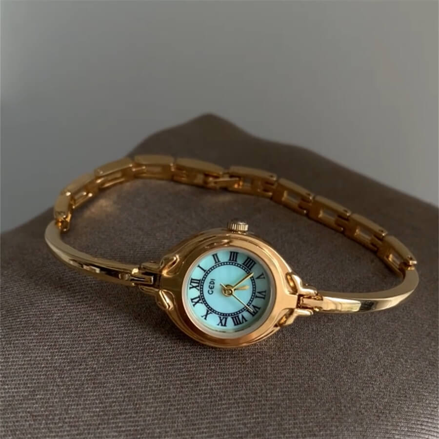 Round Face Gold Bracelet Watch