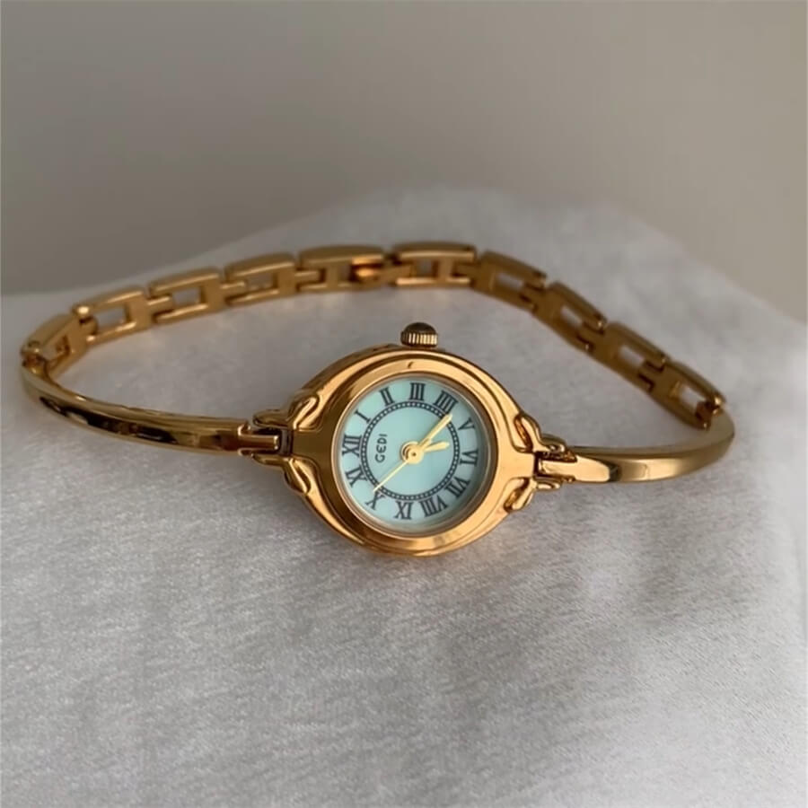 Round Face Gold Bracelet Watch