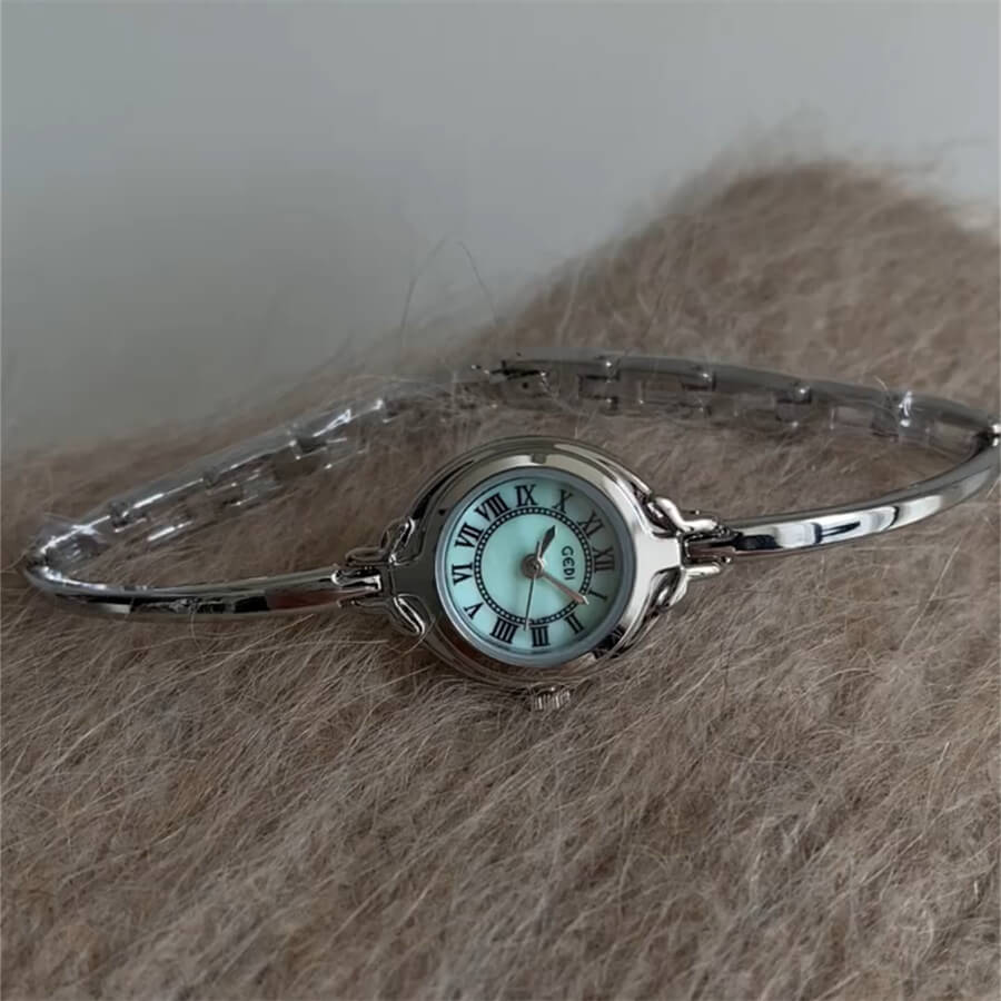 Round Face Gold Bracelet Watch