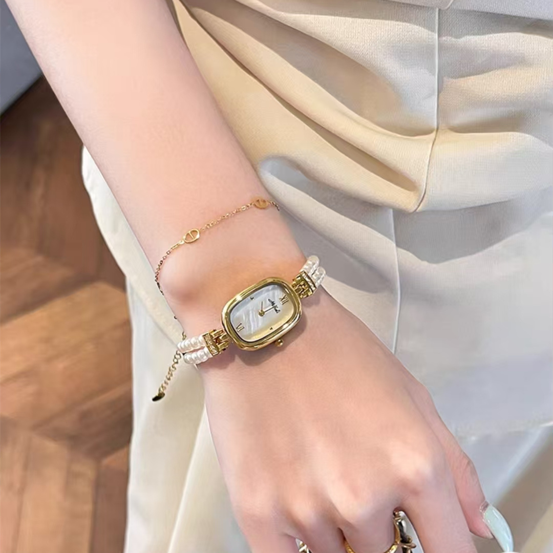 Dainty Mother of Pearl Oval Face Pearl Chain Ladies Watch