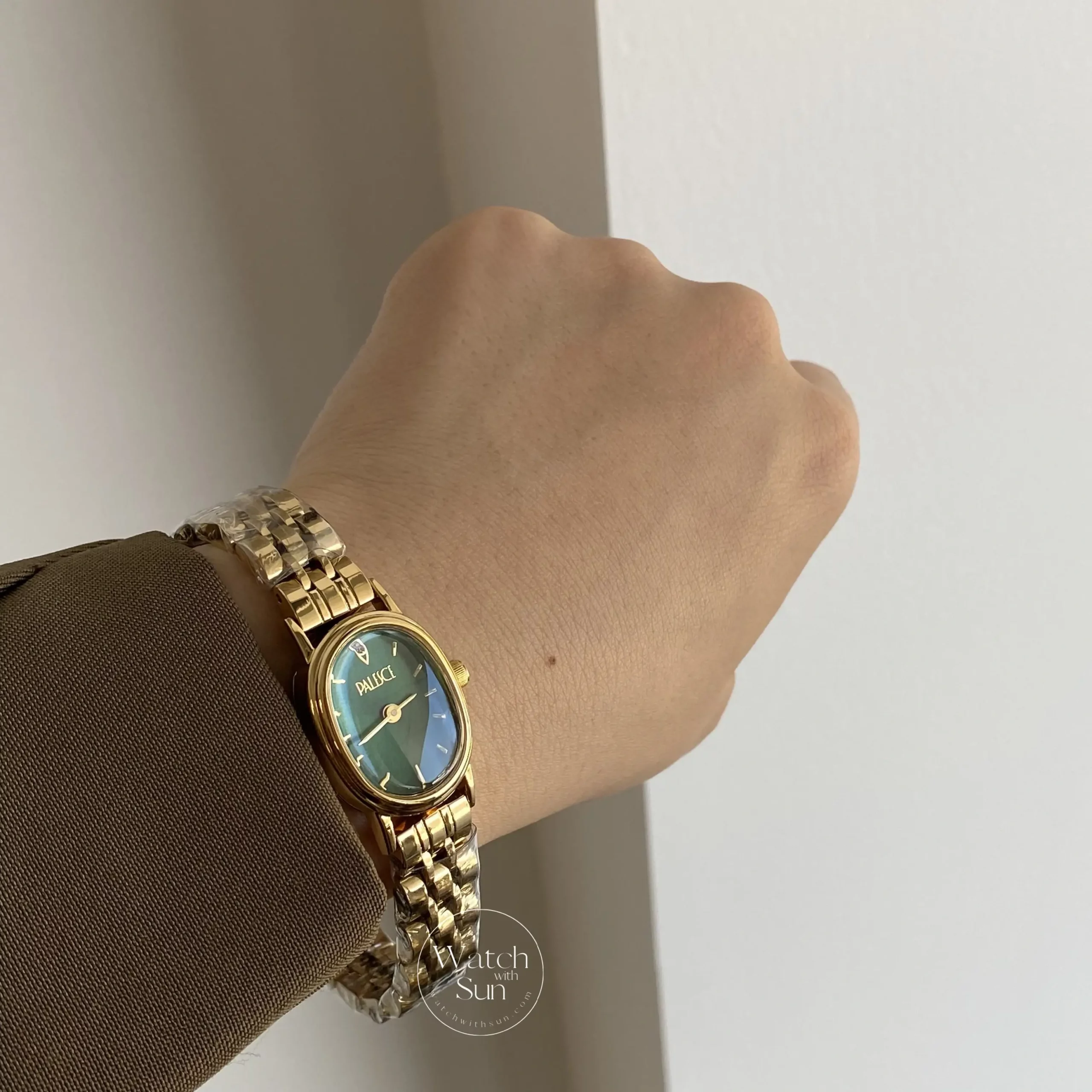 Oval Face Gold/Emerald Green Dial Bracelet Watch