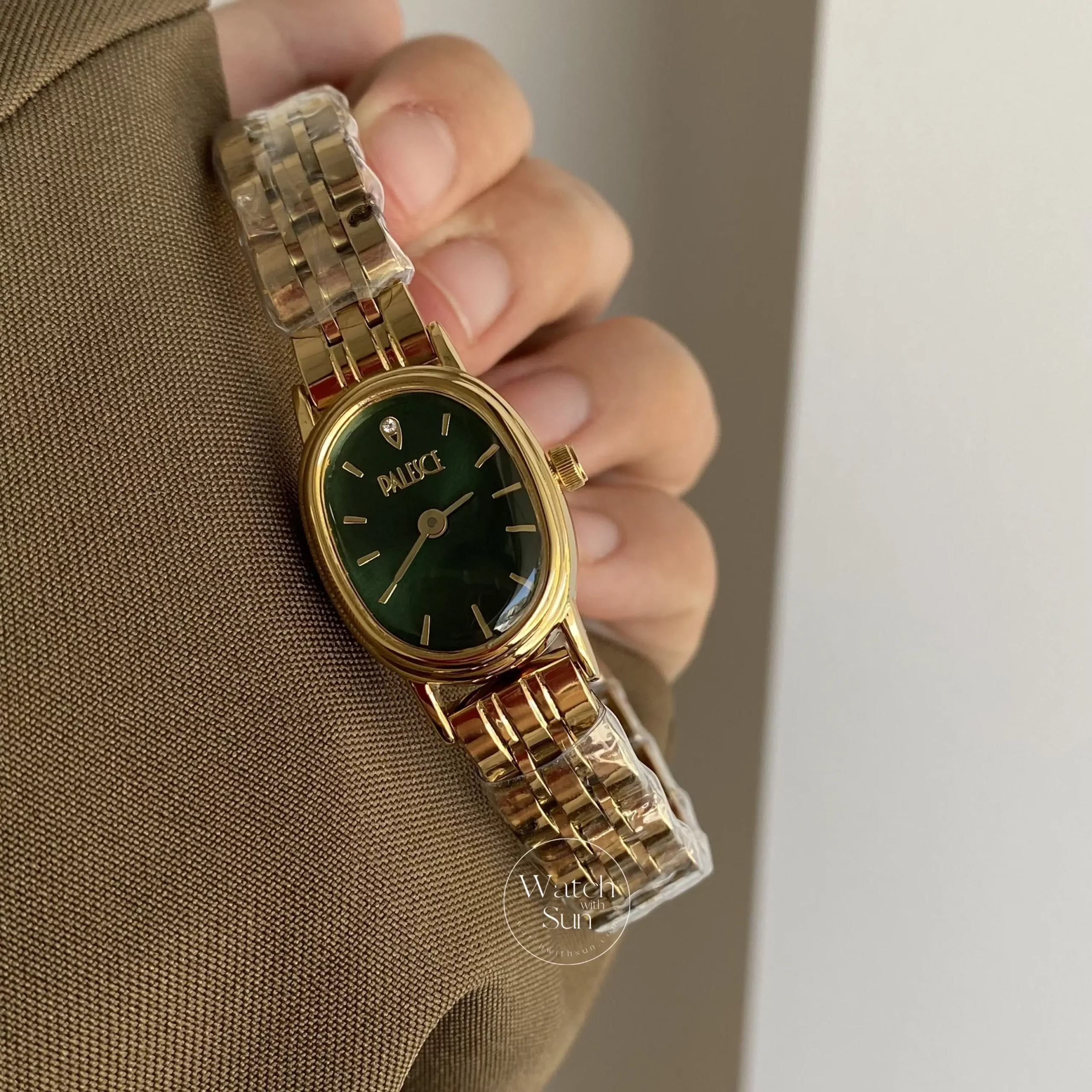 Oval Face Gold/Emerald Green Dial Bracelet Watch