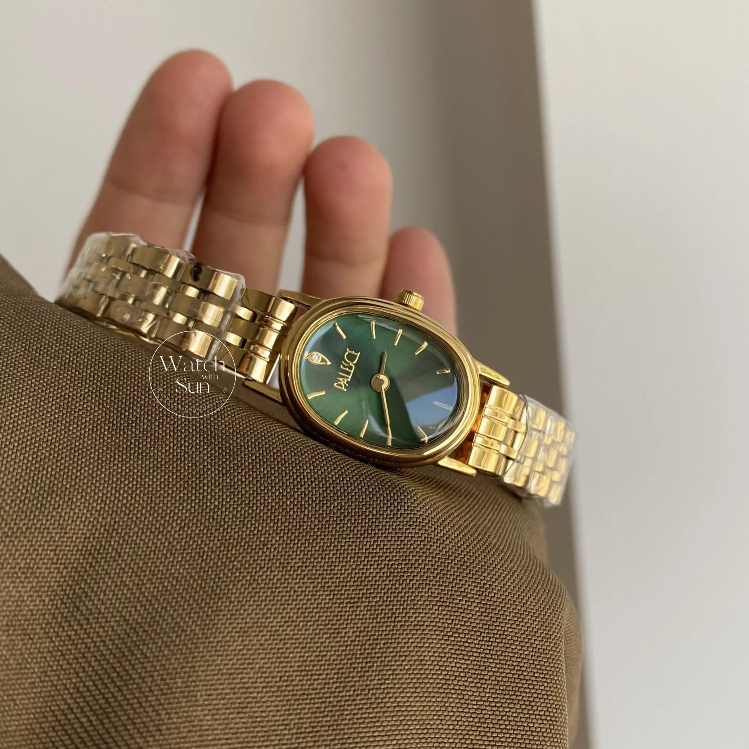 Oval Face Gold/Emerald Green Dial Bracelet Watch