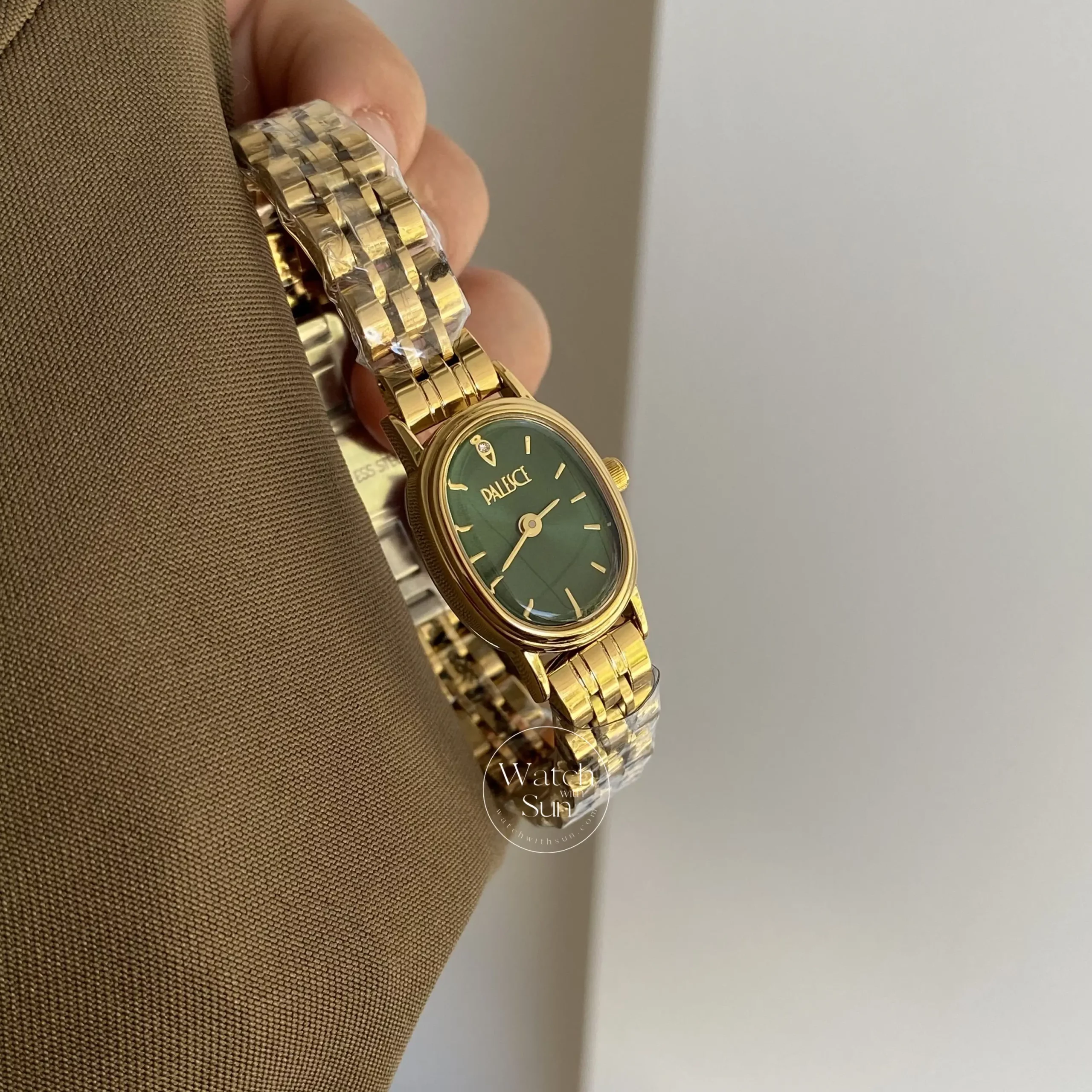 Oval Face Gold/Emerald Green Dial Bracelet Watch