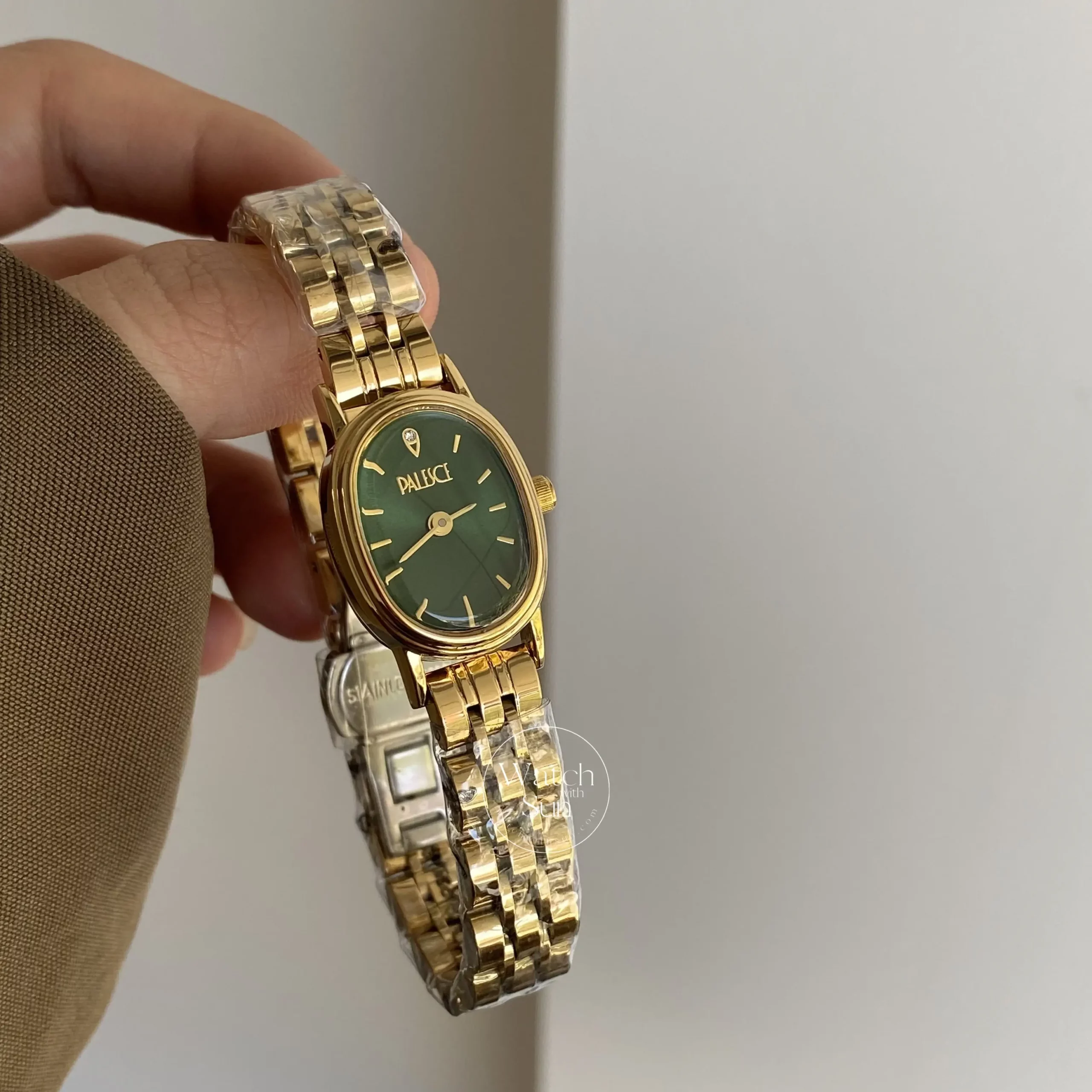 Oval Face Gold/Emerald Green Dial Bracelet Watch