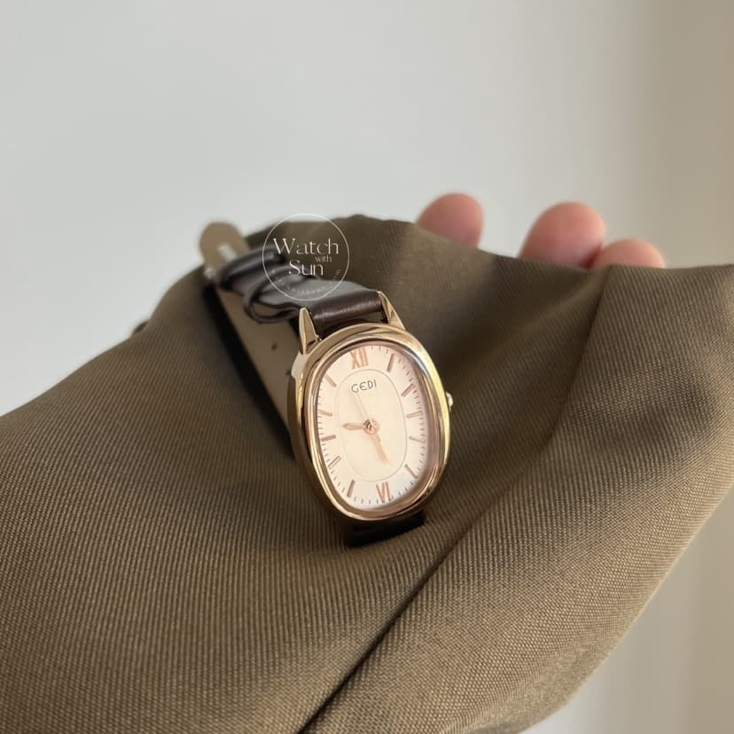 Minimalist Brown Leather Roman Numeral Oval Dial Women's Watch