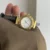 Dainty Mother of Pearl Round Face Black Leather Watch
