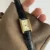 Classic black leather square Roman numeral gold dial watch