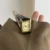 Classic black leather square Roman numeral gold dial watch