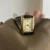 Classic black leather square Roman numeral gold dial watch