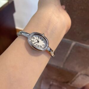 Vintage-Inspired Gold Oval Watch for Women Roman Numeral Dial Bangle Watch