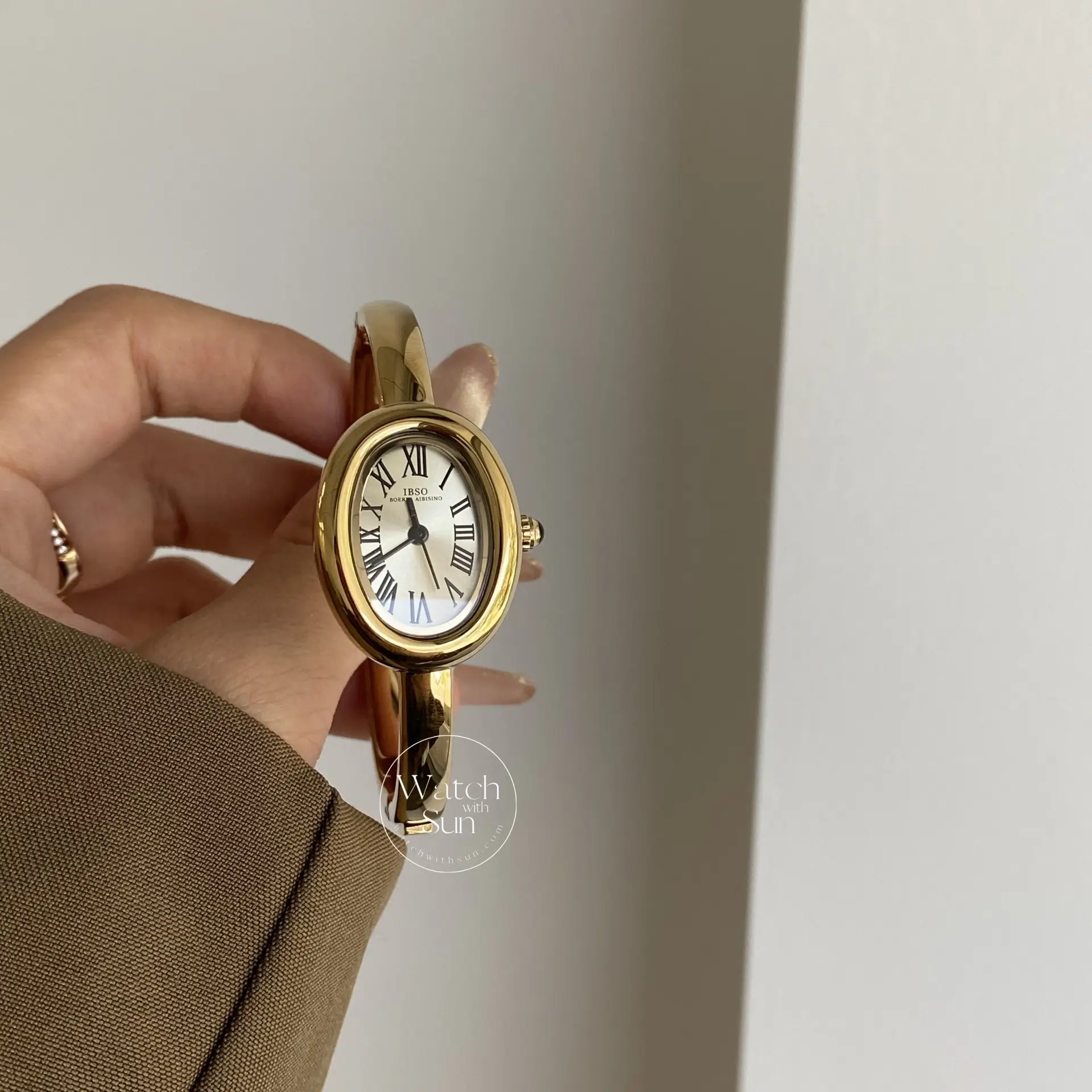 Vintage Gold Oval Watch for Women Roman Numeral Dial Bangle Watch