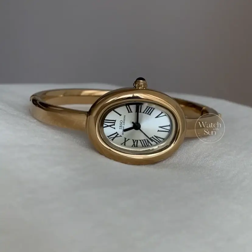 Vintage Gold Oval Watch for Women Roman Numeral Dial Bangle Watch
