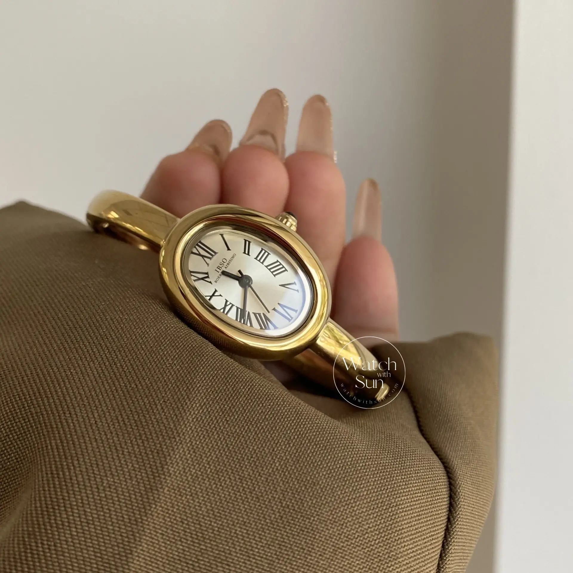 Vintage Gold Oval Watch for Women Roman Numeral Dial Bangle Watch