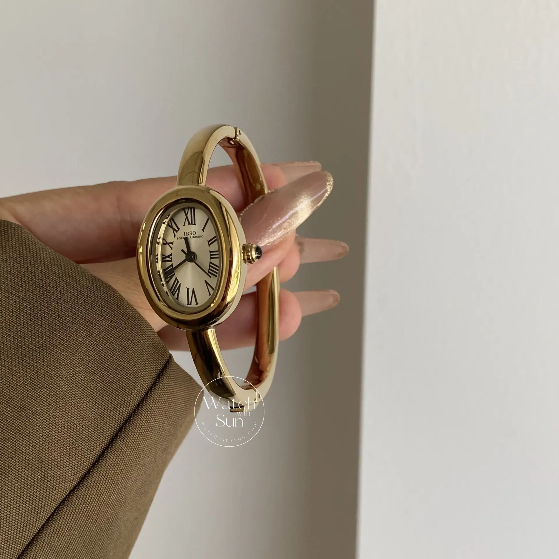 Vintage Gold Oval Watch for Women Roman Numeral Dial Bangle Watch