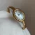 Vintage Gold Oval Watch for Women Roman Numeral Dial Bangle Watch