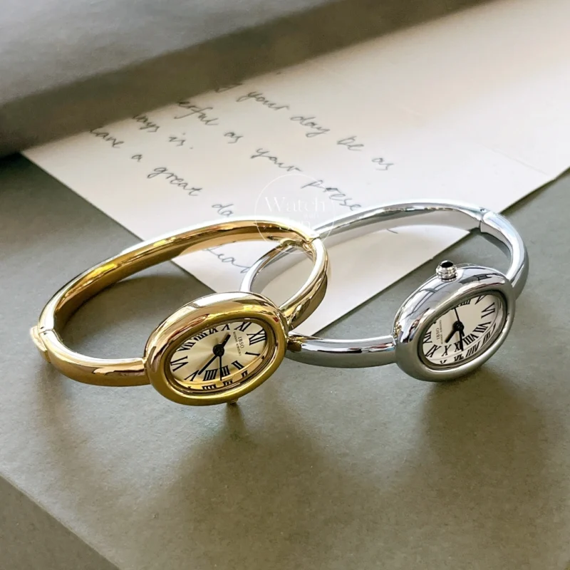 Vintage-Inspired Gold Oval Watch for Women Roman Numeral Dial Bangle Watch