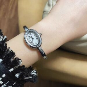 Vintage Gold Oval Watch Roman Numeral Dial Bangle Watch for Women