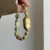 Oval Dial Gold Bracelet Watch for Women