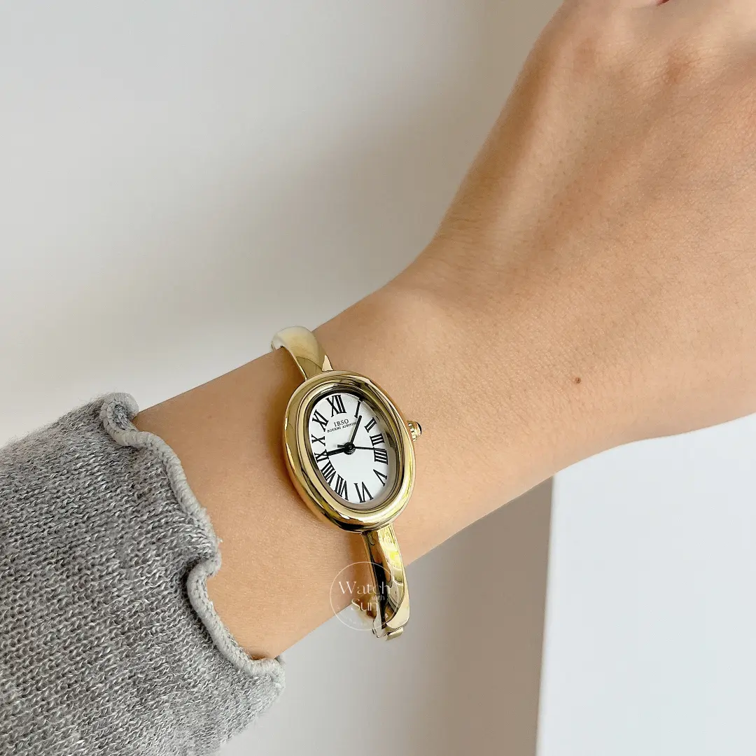 Vintage Gold Oval Watch Roman Numeral Dial Bangle Watch for Women
