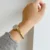 Vintage Gold Oval Watch Roman Numeral Dial Bangle Watch for Women