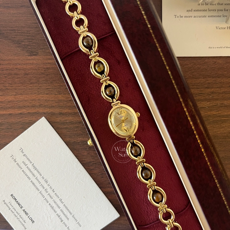 N556-4 Oval Face Tiger's Eyes Stone Gold Bracelet Watch