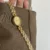 Vintage-Inspired Gold Oval Face Bracelet Watch for Women