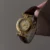 Vintage-inspired Gold Roman Numeral Dial Brown Leather Strap Watch for Women