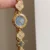 Four Leaf Clover Bracelet Watch for Women Crystal Accents Mother of Pearl Dial Women's Watch
