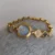 Four Leaf Clover Bracelet Watch for Women Crystal Accents Mother of Pearl Dial Women's Watch